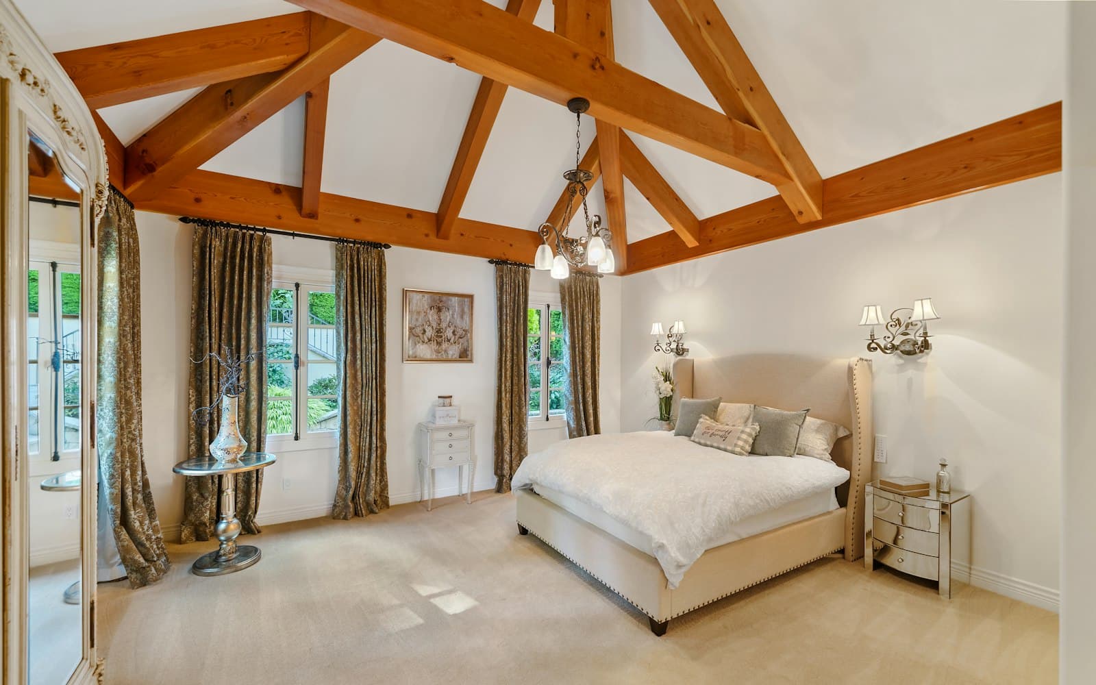 Loft conversion bedroom with exposed roof beams