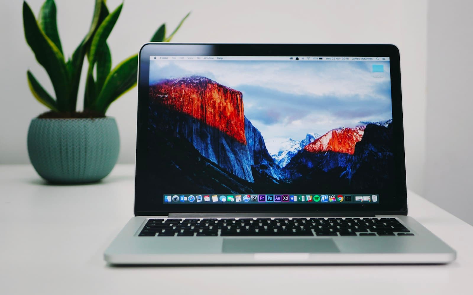 Web design workspace with a laptop